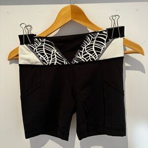 Lululemon bike short. Size 4. Black with geometric print on waistband.